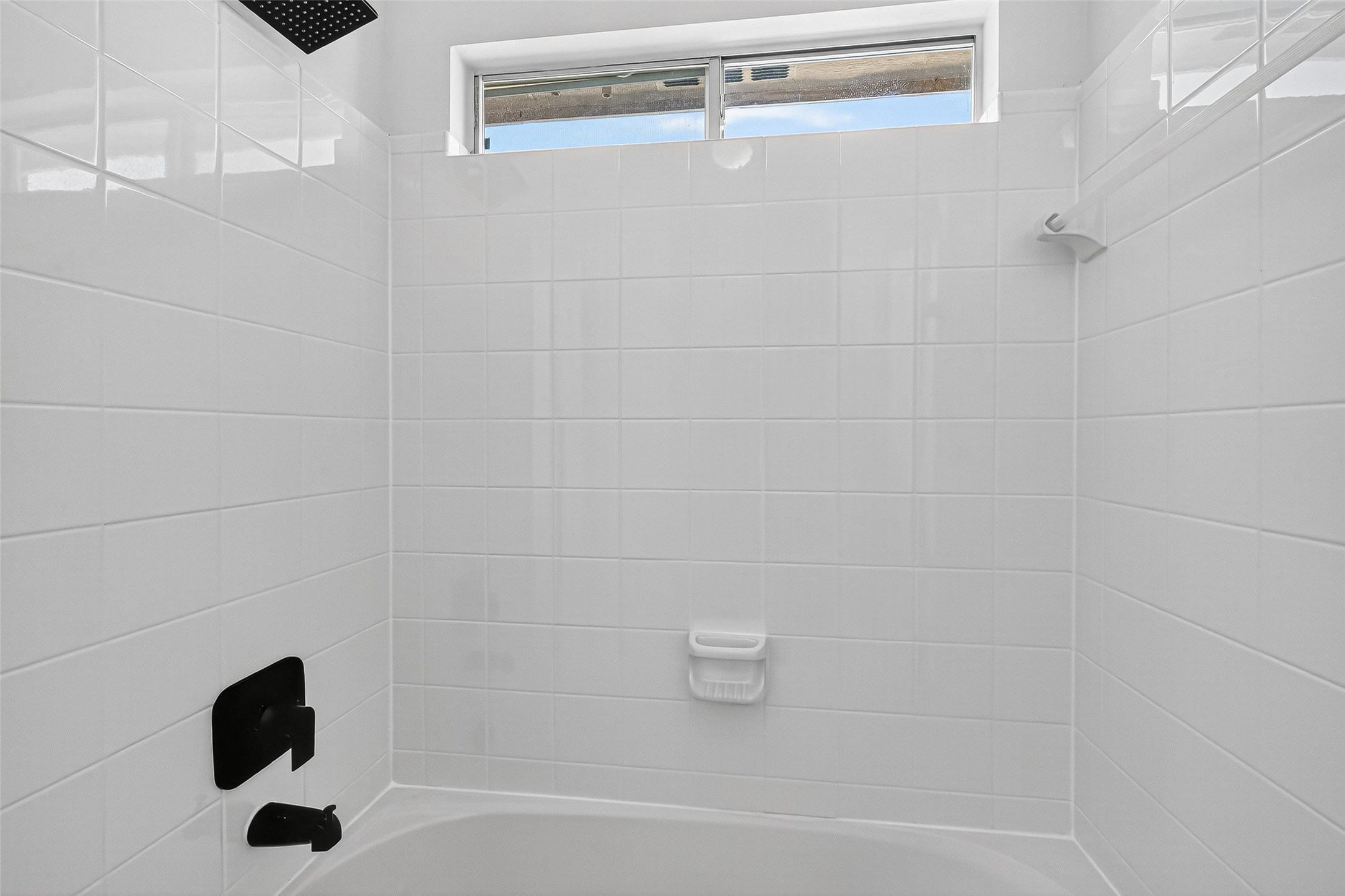 11727 Spring Path Court Tomball, TX 77377 - Photo 37 of 50 a bathroom with a shower and a bathtub