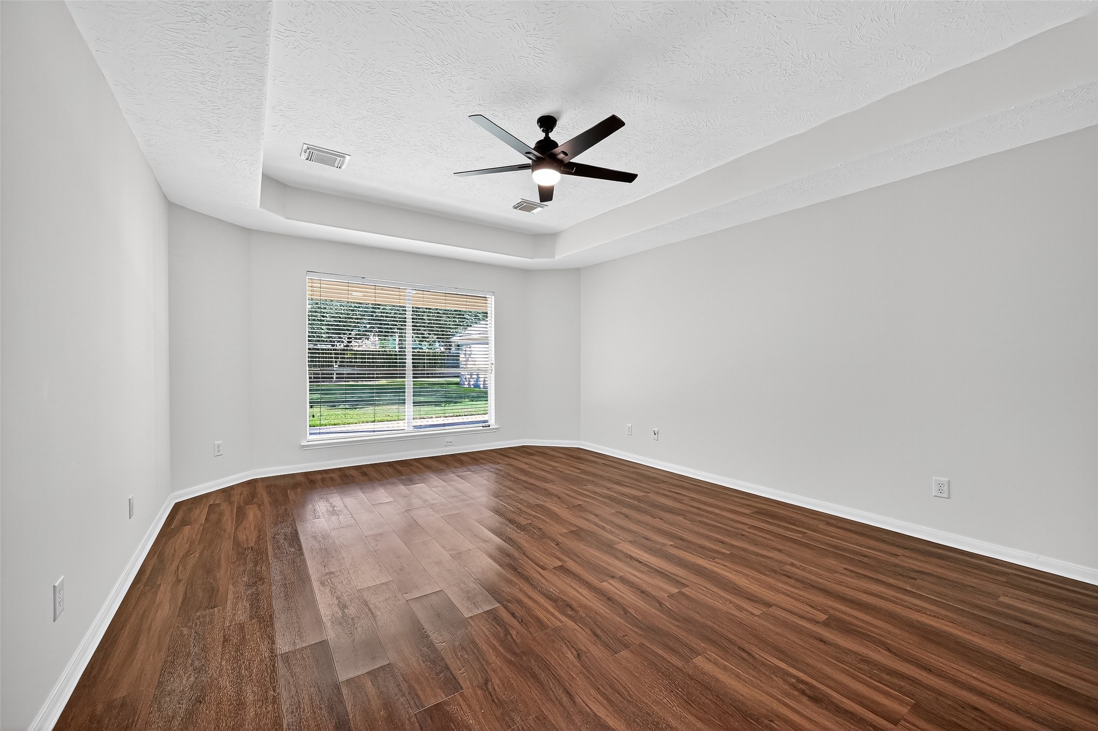 11727 Spring Path Court Tomball, TX 77377 - Photo 41 of 50 wooden floor in an empty room with a window