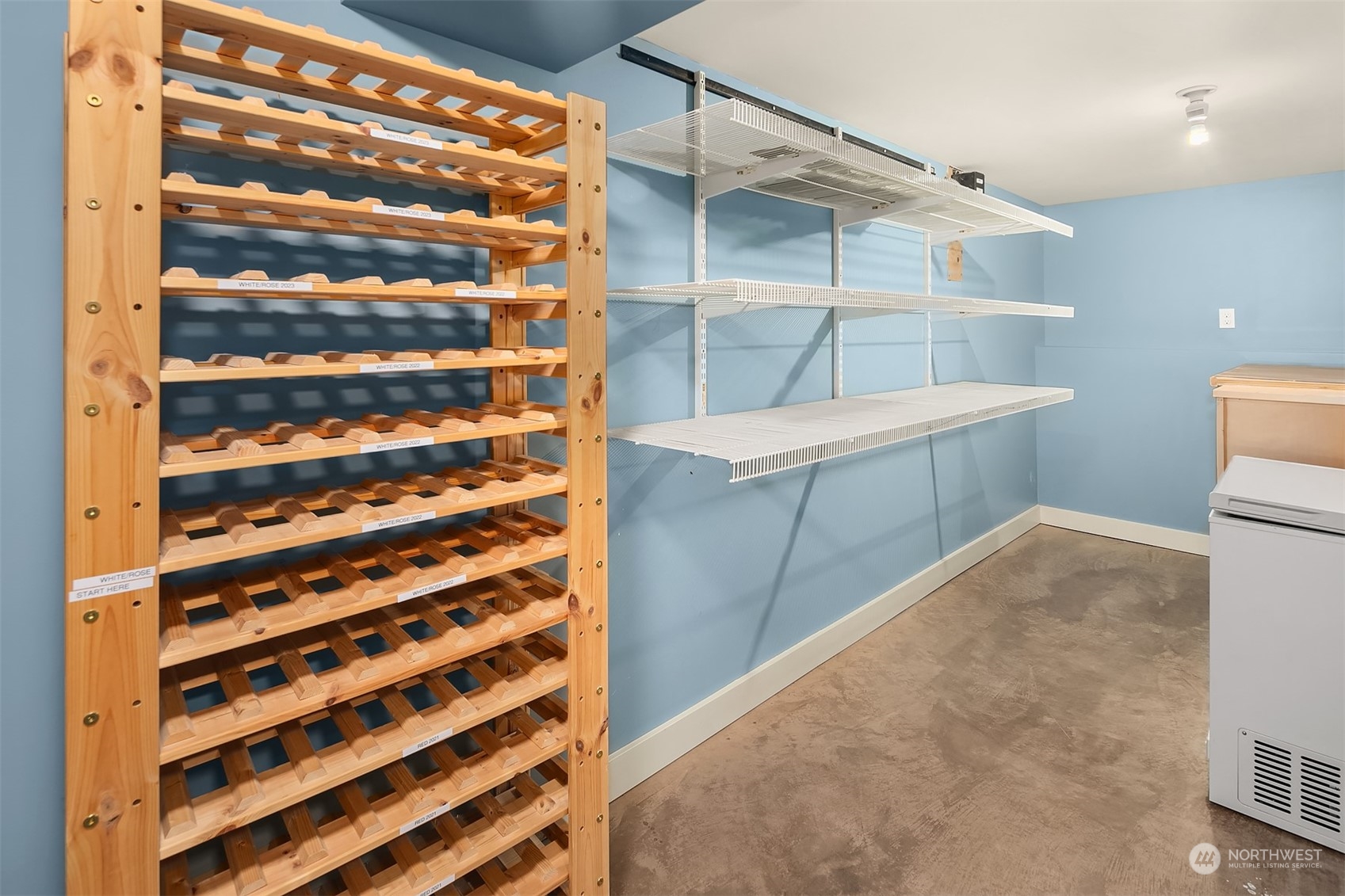 1925 East Lynn Street Seattle, WA 98112 - Photo 29 of 36 a view of walk in closet with empty racks