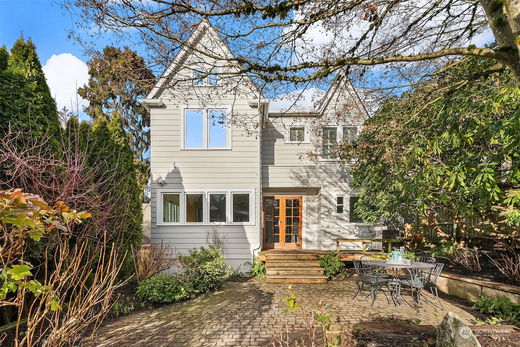 1925 East Lynn Street Seattle, WA 98112 - Photo 30 of 36 a view of a house with a yard