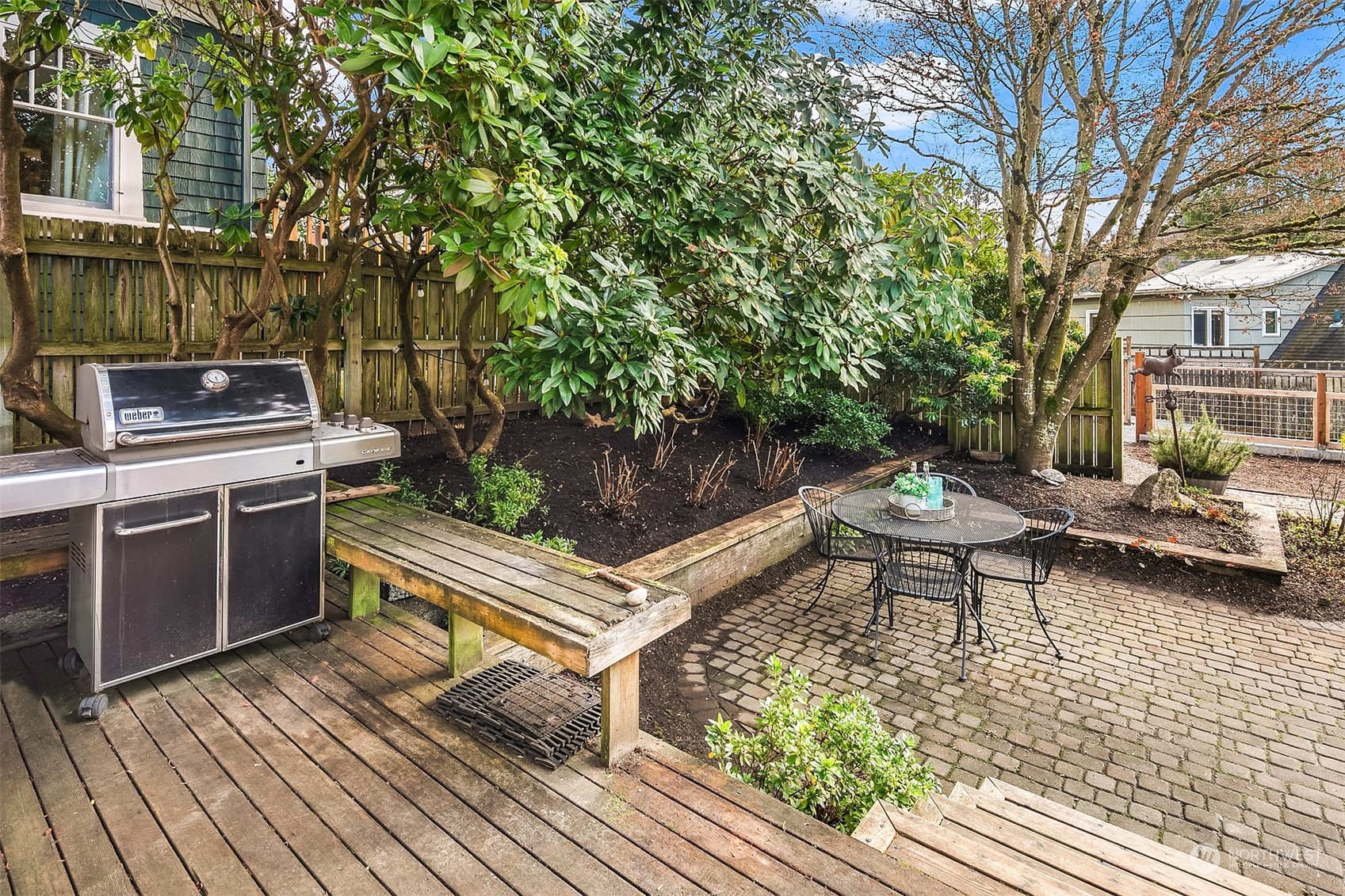 1925 East Lynn Street Seattle, WA 98112 - Photo 32 of 36 a view of a patio with a table and chairs