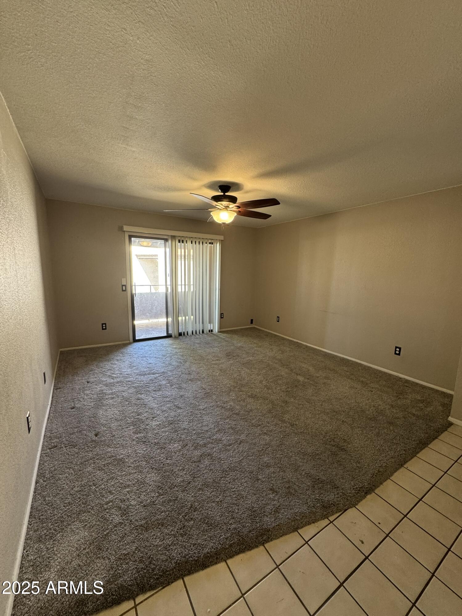 2146 West Isabella Avenue, Unit 213 Mesa, AZ 85202 - Photo 1 of 13 an empty room with windows