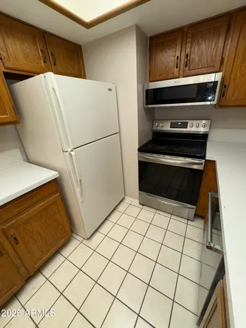 a utility room with washer and dryer