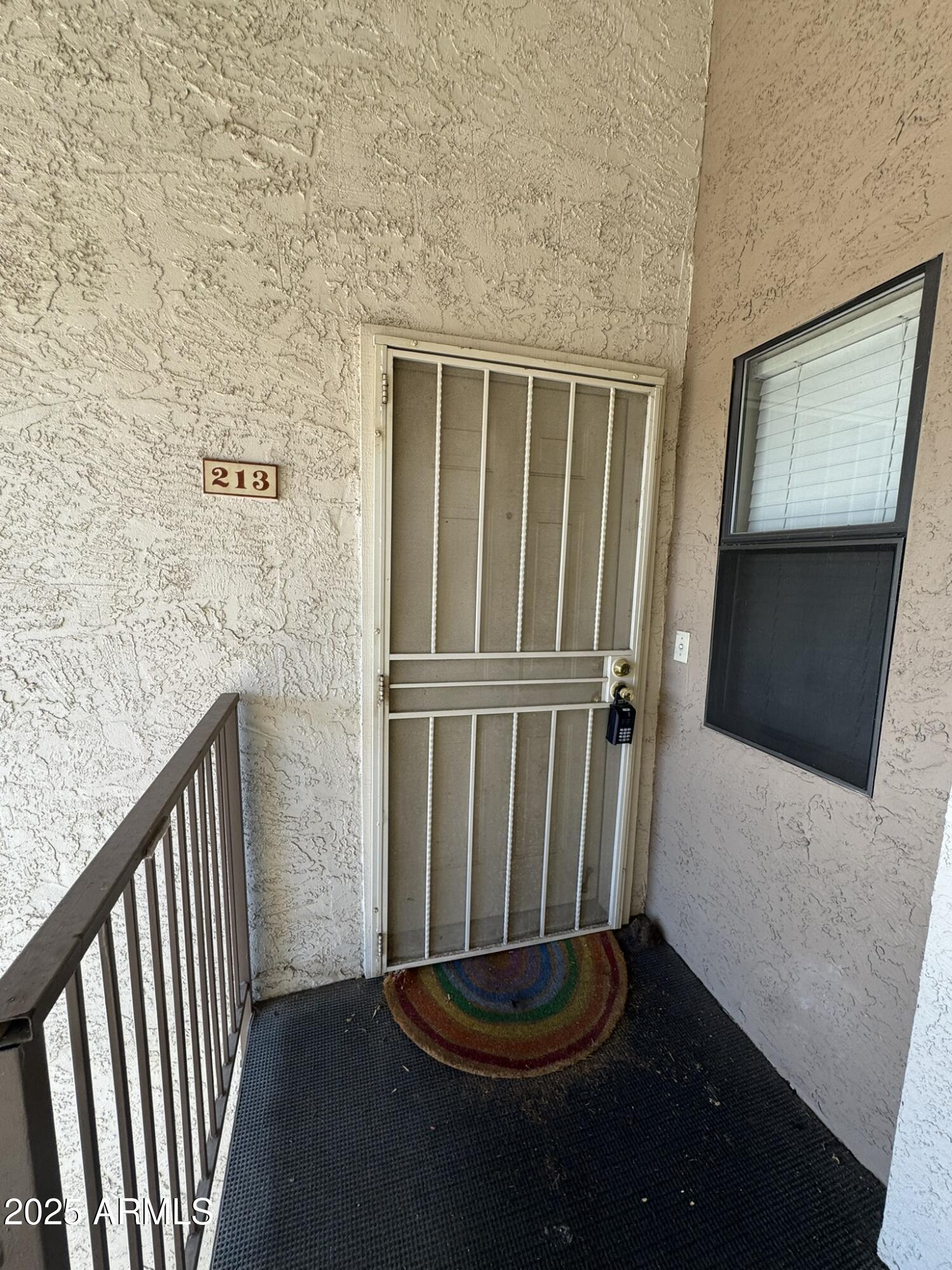 2146 West Isabella Avenue, Unit 213 Mesa, AZ 85202 - Photo 9 of 13 a bathroom with a sink and a mirror