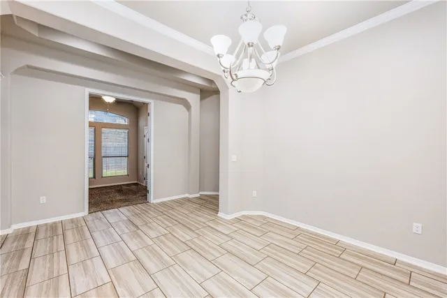 a view of a room with a chandelier