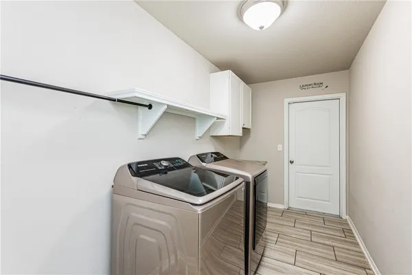 a kitchen that has a sink and a stove