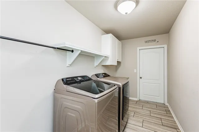 a kitchen that has a sink and a stove