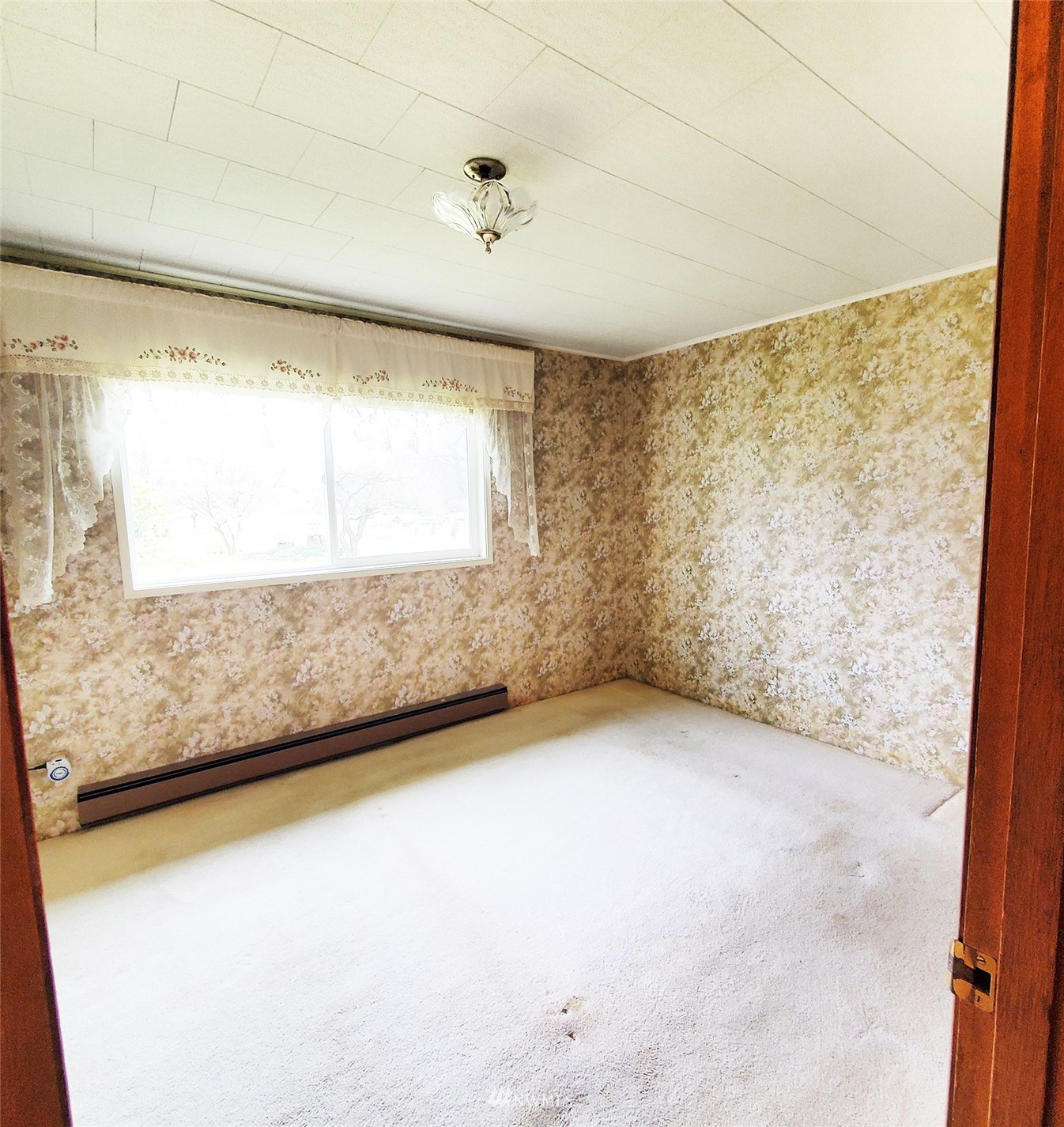 12890 Pulver Road Burlington, WA 98233 - Photo 13 of 18 a view of an empty room and a window