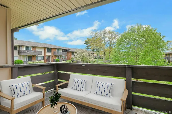 a view of a chairs in a balcony