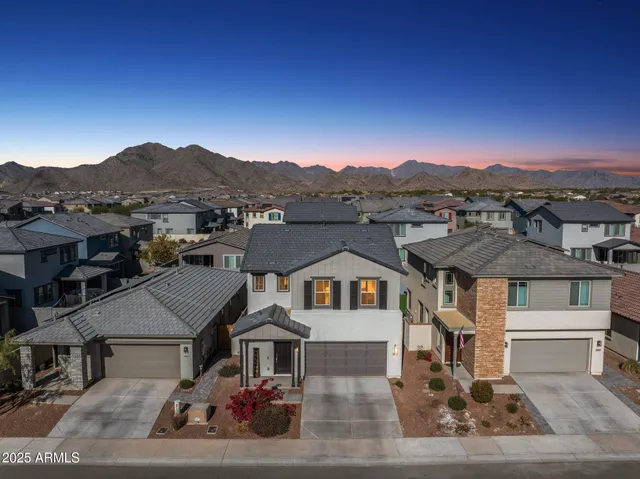 a view of house with large windows