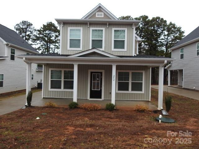 252 Mills Avenue Troutman, NC 28166 - Photo 1 of 15 front view of a house with a yard