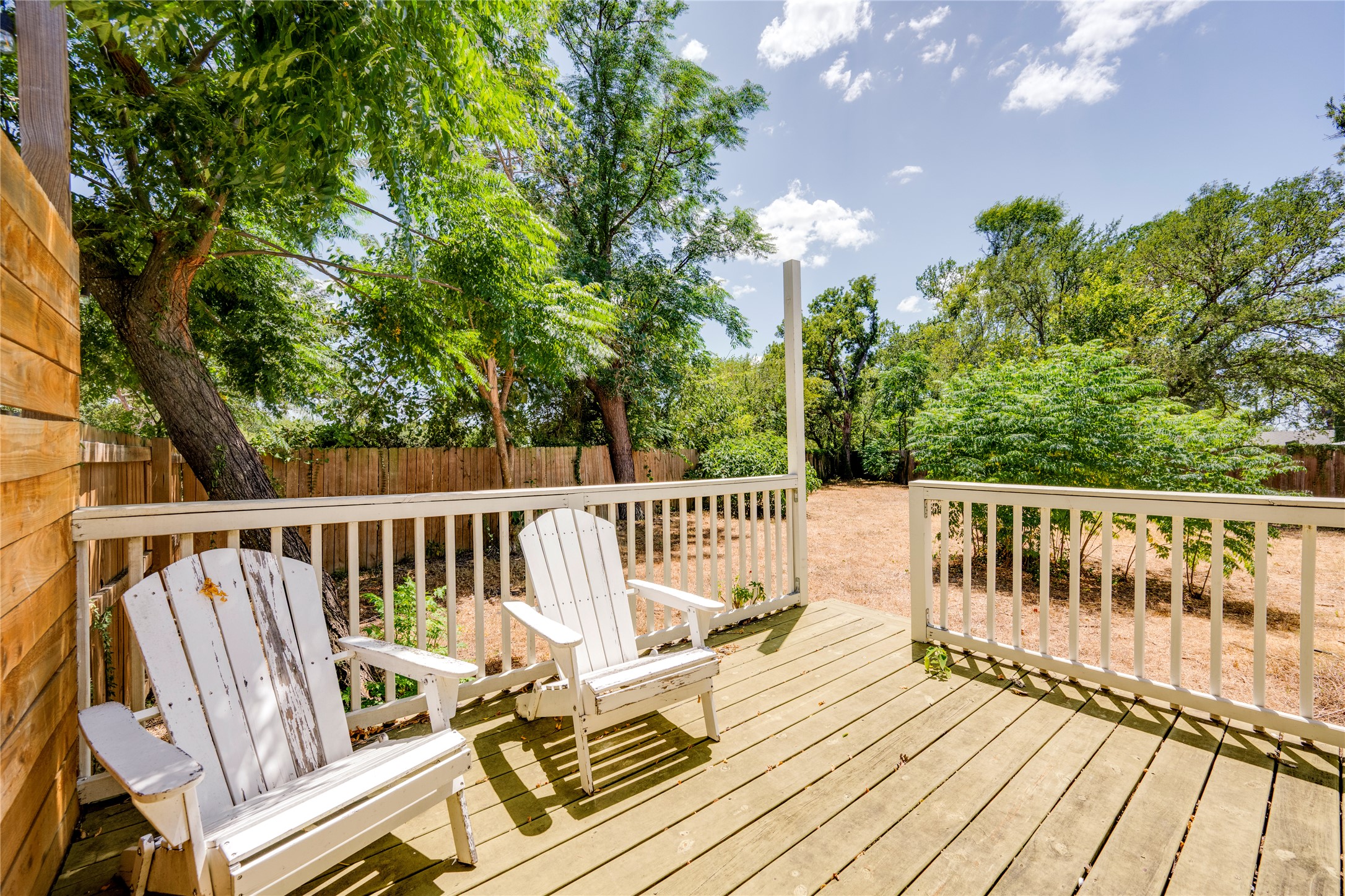 1400 Marcus Place, Unit B Austin, TX 78721 - Photo 29 of 39 A tranquil deck area provides ample space for outdoor relaxation and entertainment.