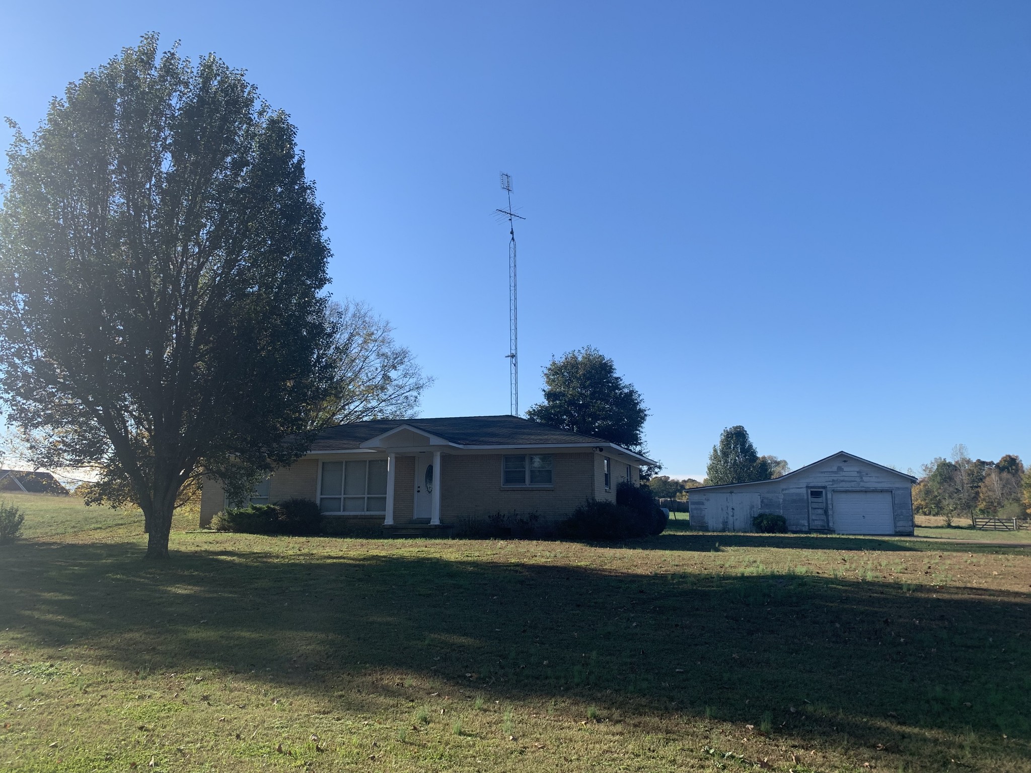341 Busby Road Loretto, TN 38469 - Photo 14 of 42 a view of a house with a yard