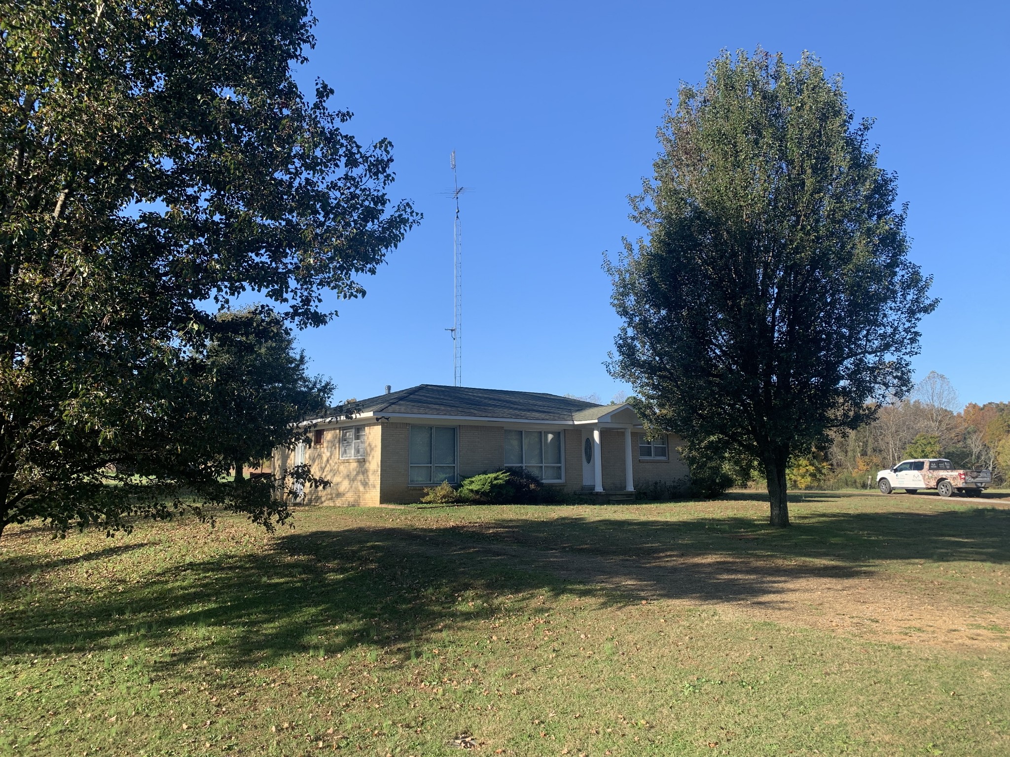 341 Busby Road Loretto, TN 38469 - Photo 15 of 42 a front view of a house with a yard