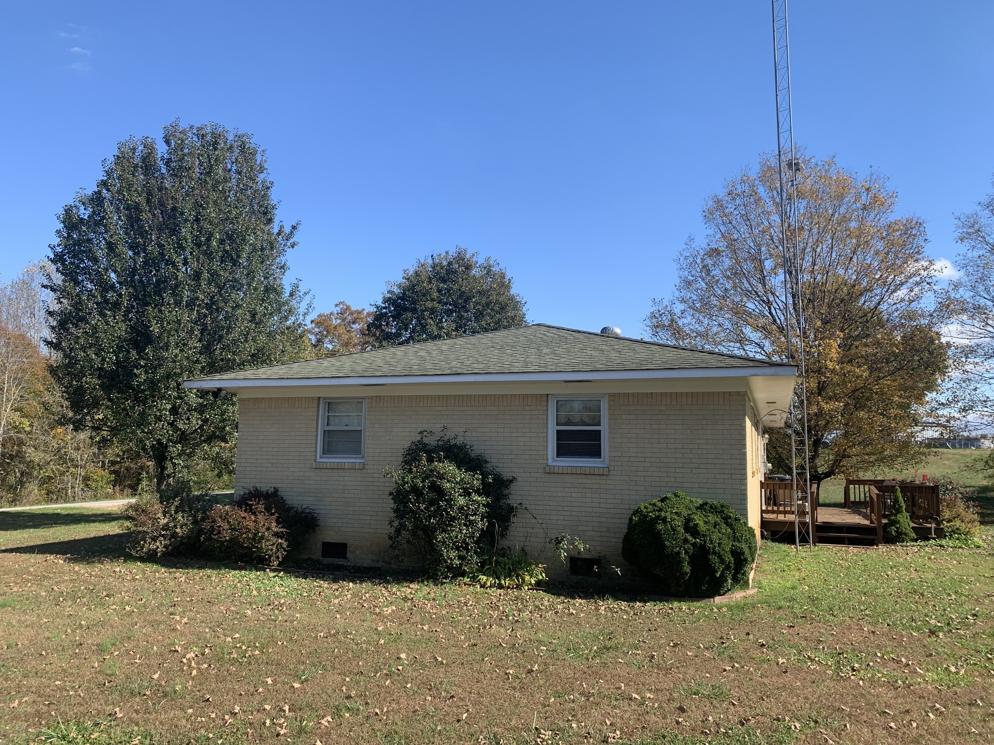 341 Busby Road Loretto, TN 38469 - Photo 21 of 42 a view of a house with a yard
