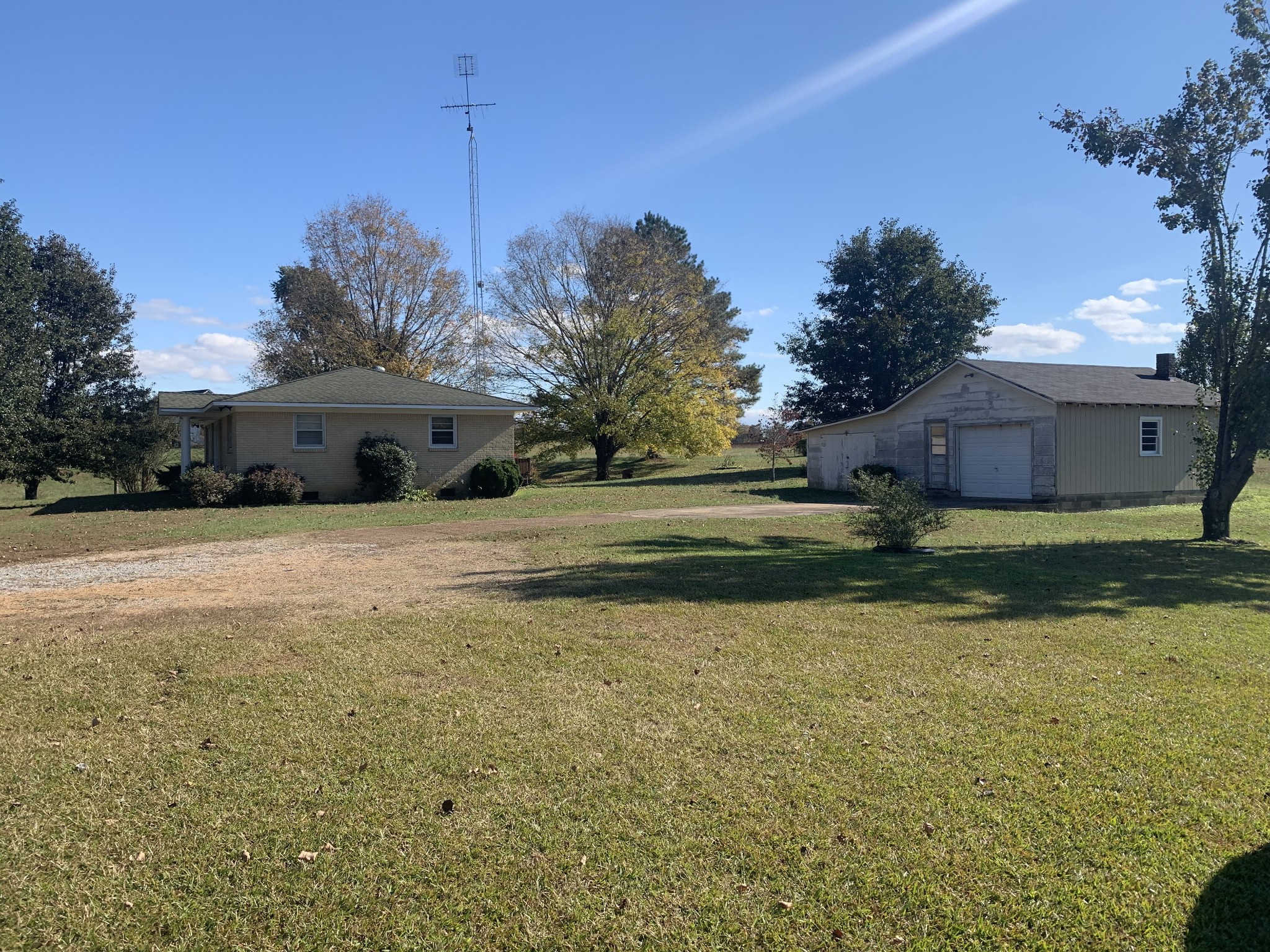 341 Busby Road Loretto, TN 38469 - Photo 23 of 42 a view of a house with a yard