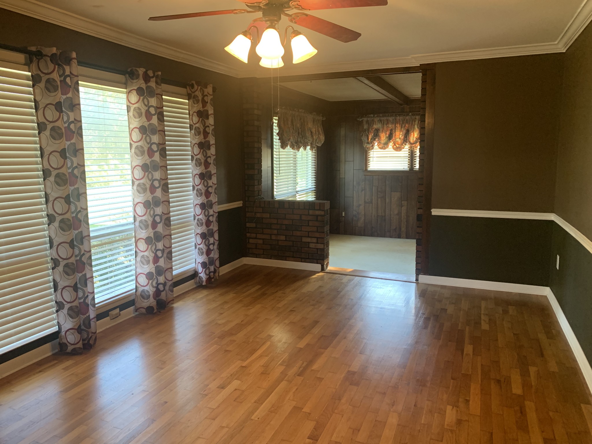 341 Busby Road Loretto, TN 38469 - Photo 27 of 42 an empty room with wooden floor and windows