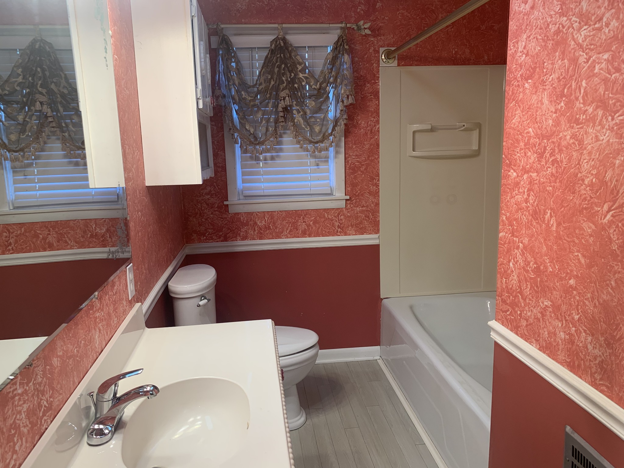 341 Busby Road Loretto, TN 38469 - Photo 28 of 42 a bathroom with a toilet and a sink