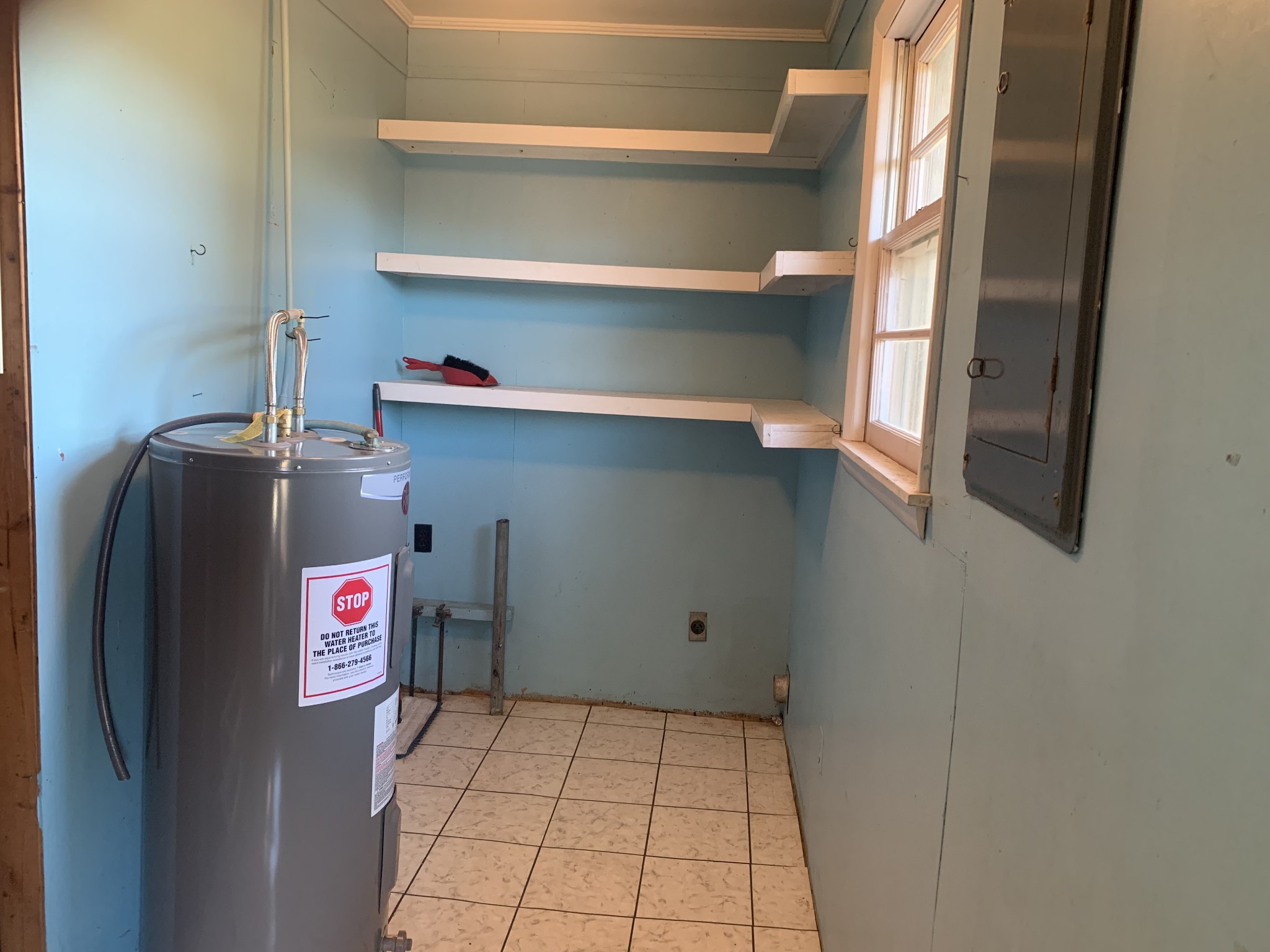 341 Busby Road Loretto, TN 38469 - Photo 35 of 42 a utility room with washer and dryer