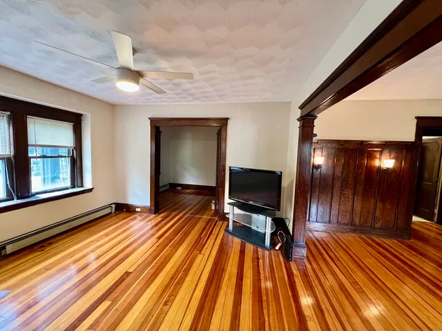 a view of outdoor space with wooden floor and furniture
