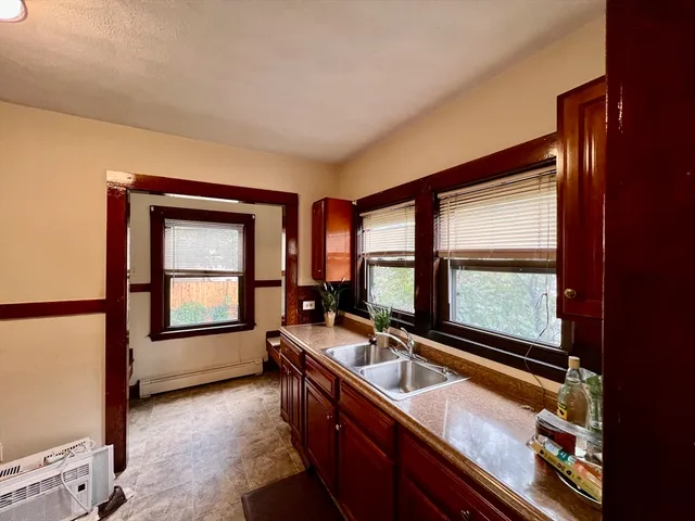a view of a kitchen from a window