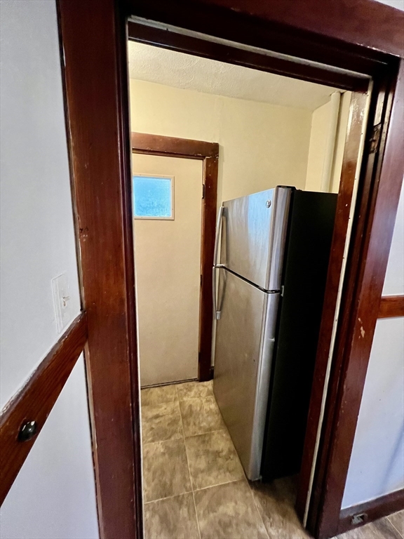 40 Copley Street, Unit 1 Cambridge, MA 02138 - Photo 9 of 21 a view of a kitchen from a window