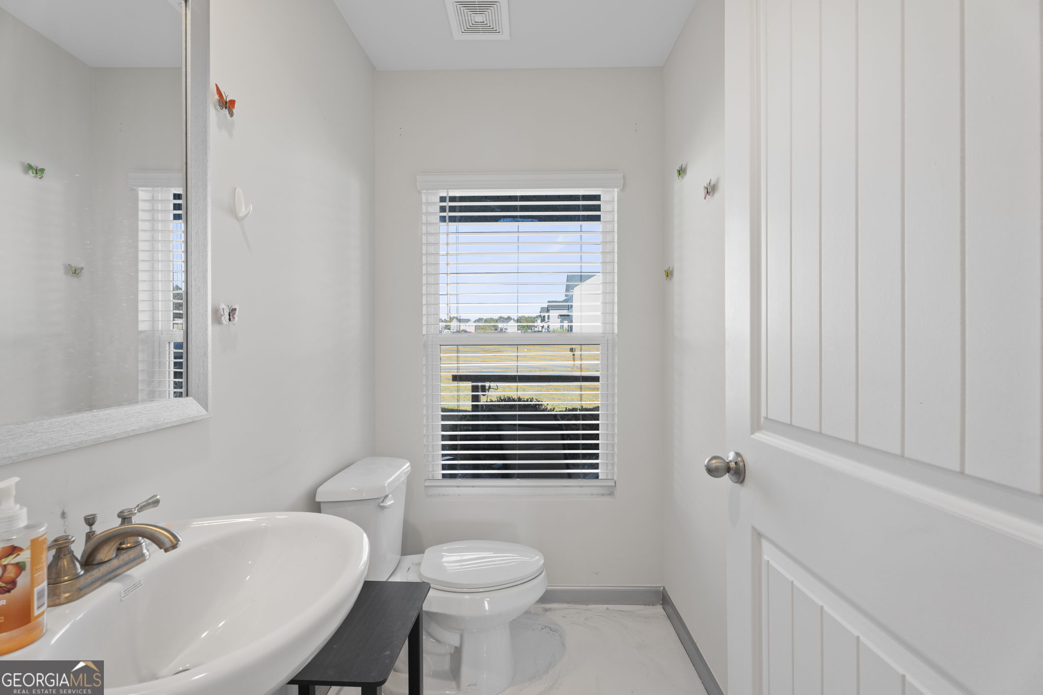 321 Kirt's Ridge Jackson, GA 30233 - Photo 16 of 57 a bathroom with a sink toilet and shower