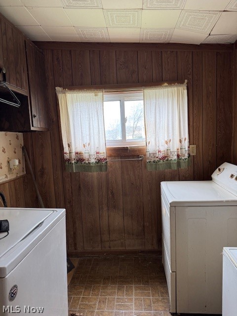 626 High Street Wellsburg, WV 26070 - Photo 10 of 18 Laundry area with washer / dryer, brick patterned floors, wooden walls, and an ornate ceiling