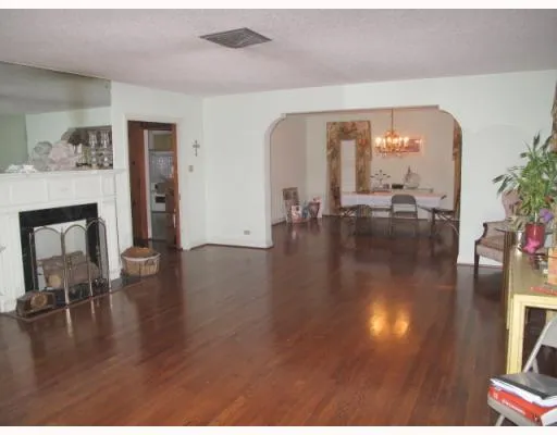 a lobby with furniture and floor to ceiling window