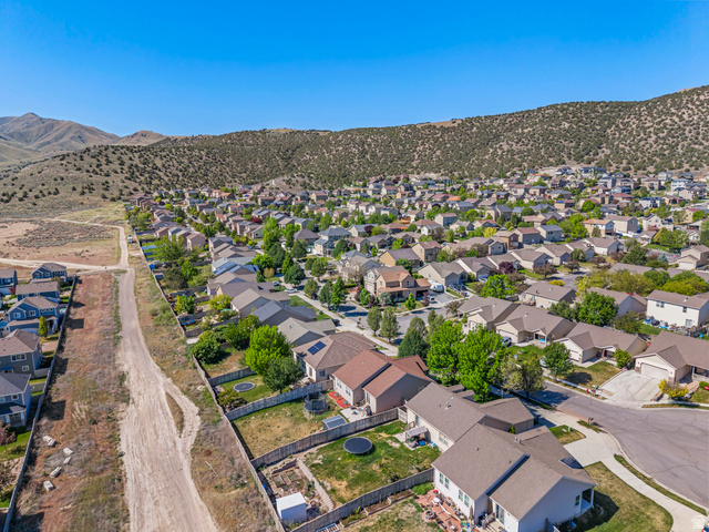 7092 Cherokee Street Eagle Mountain, UT 84005 - Photo 2 of 27 Residential community nestled against a natural hillside