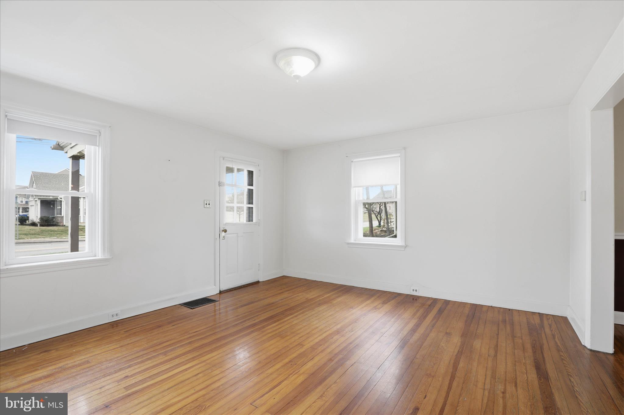 1632 Lampeter Road Lancaster, PA 17602 - Photo 12 of 46 a view of empty room with wooden floor and fan