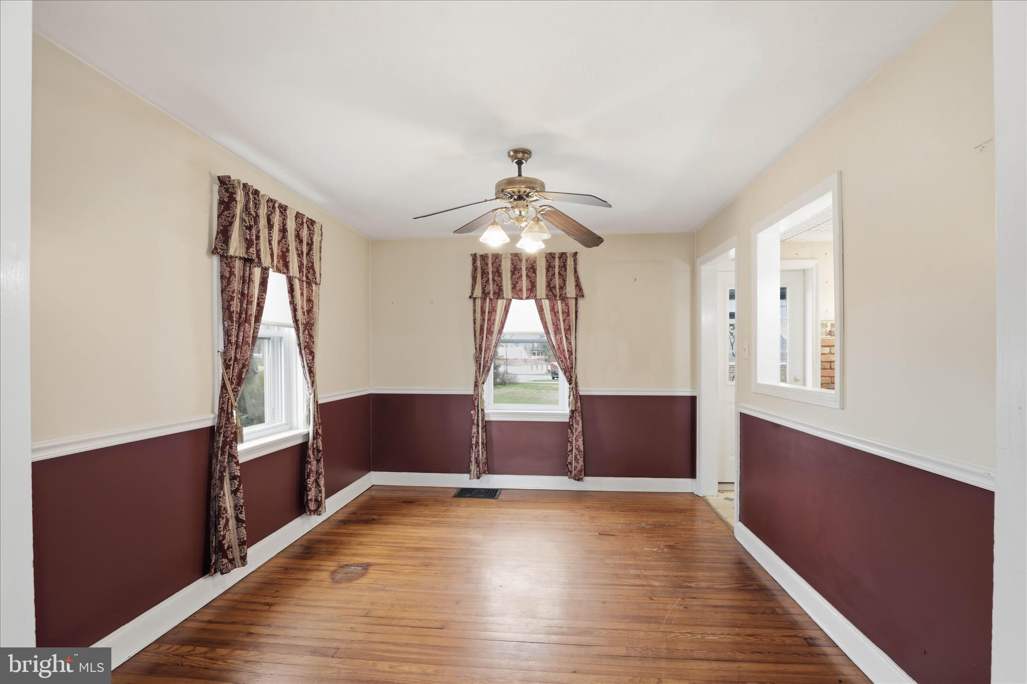1632 Lampeter Road Lancaster, PA 17602 - Photo 13 of 46 a view of empty room with wooden floor and fan