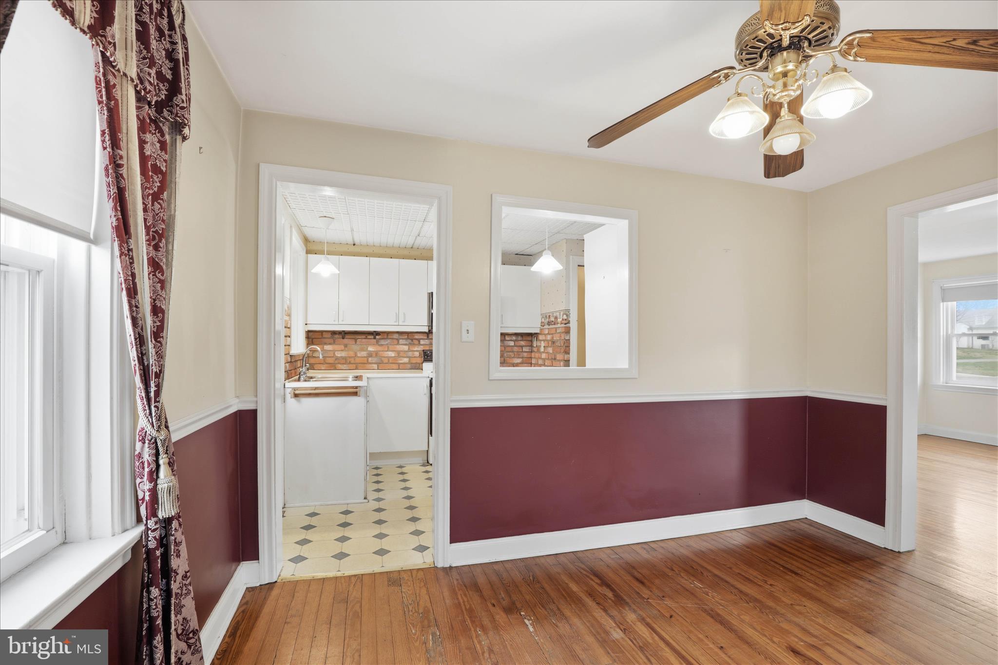 1632 Lampeter Road Lancaster, PA 17602 - Photo 15 of 46 a view of kitchen and hallway with wooden floor