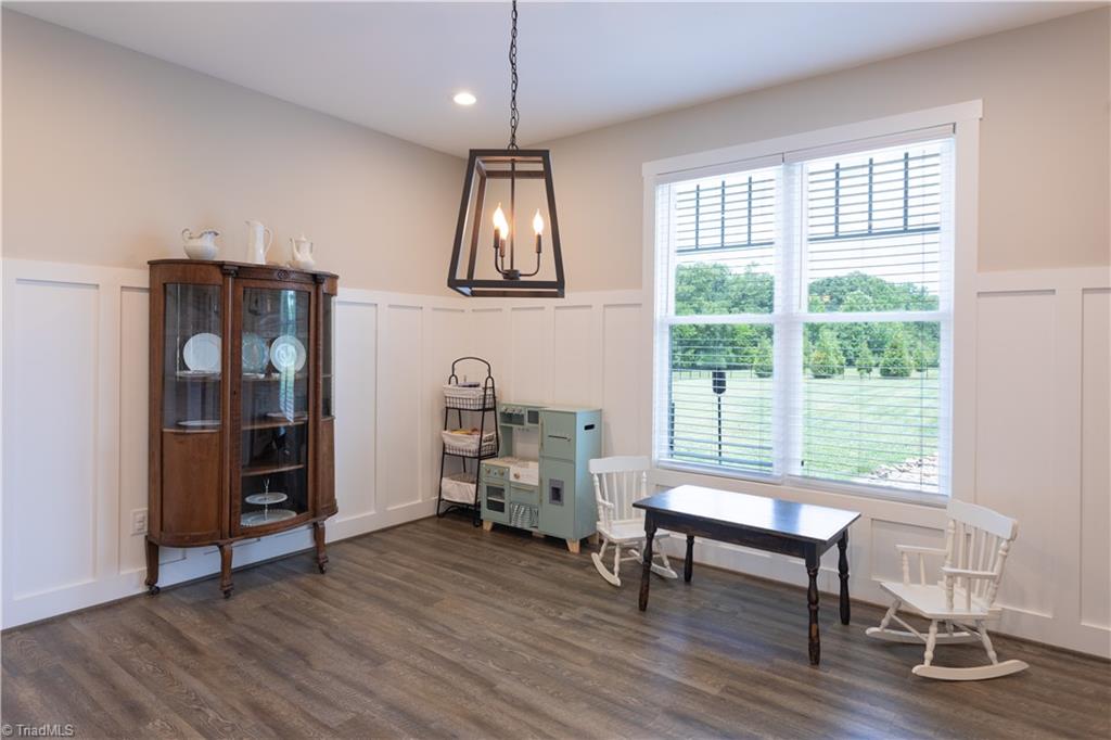 393 Scout Road Lexington, NC 27292 - Photo 14 of 47 The breakfast room is plenty large enough for a generous table. This lovely room is right off of the kitchen and overlooks the fenced backyard.
