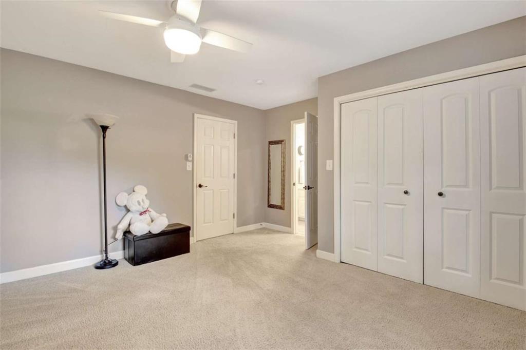 110 Sandtrap Ridge Peachtree City, GA 30269 - Photo 58 of 85 a view of an empty room and a window