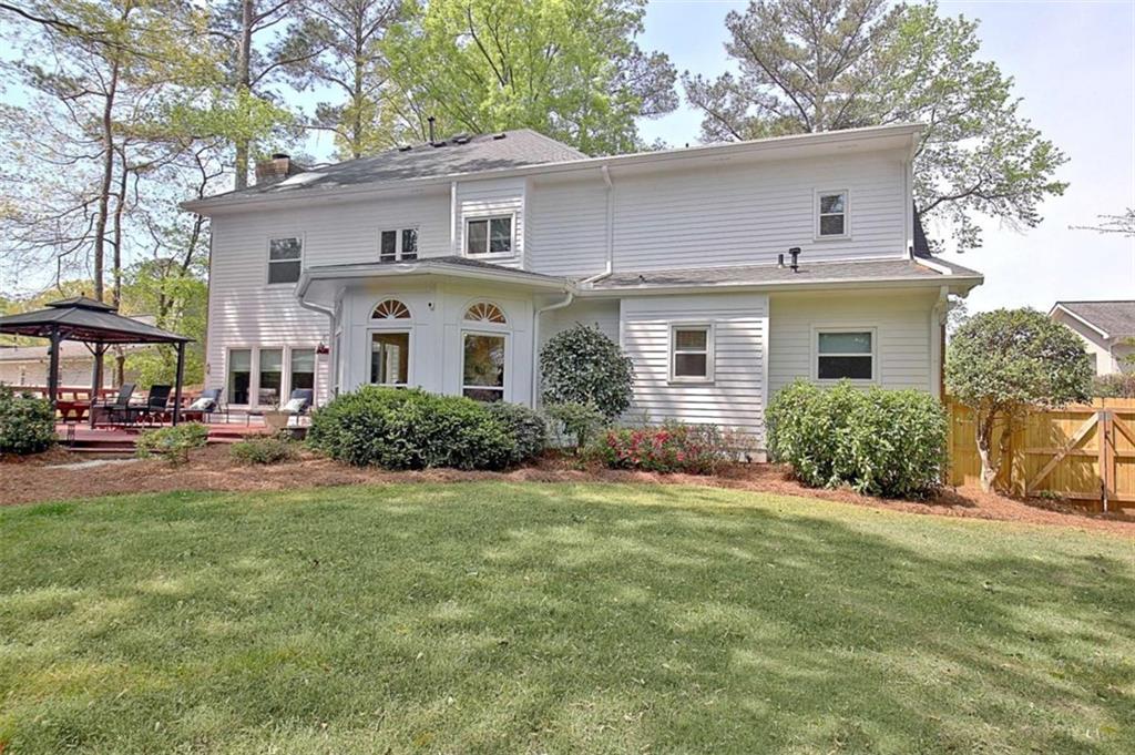 110 Sandtrap Ridge Peachtree City, GA 30269 - Photo 79 of 85 a front view of a house with a yard