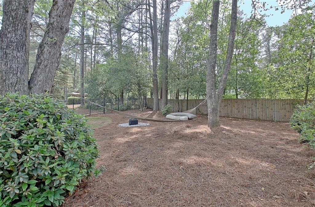 110 Sandtrap Ridge Peachtree City, GA 30269 - Photo 82 of 85 a view of a tree with a yard
