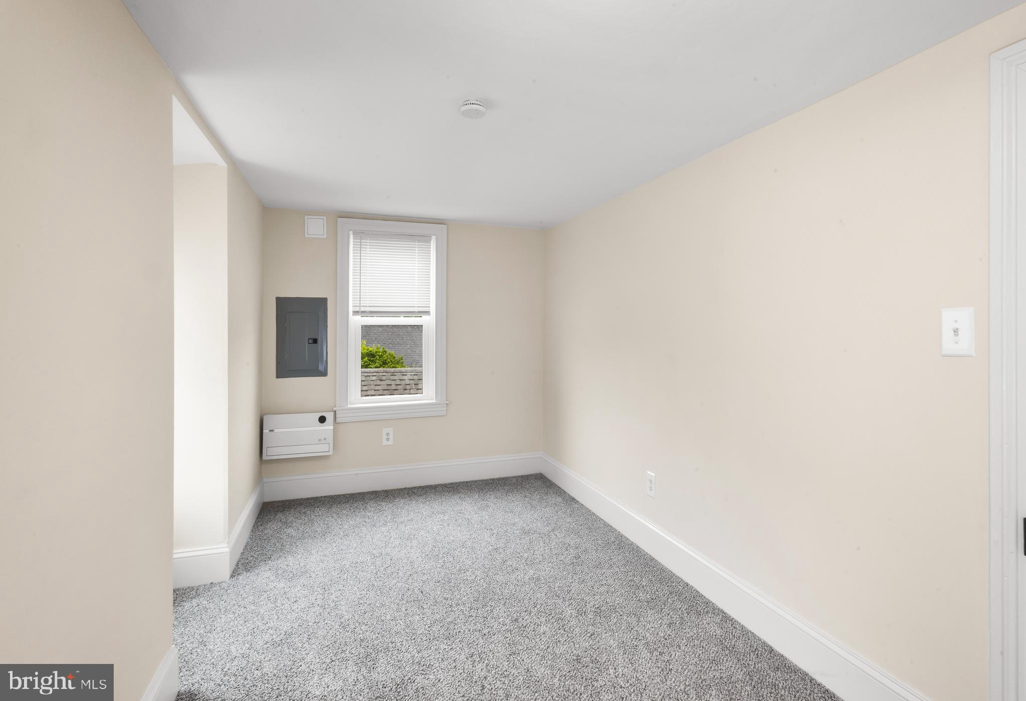 74 Pitman Avenue, Unit B Pitman, NJ 08071 - Photo 15 of 30 a view of an empty room with a window
