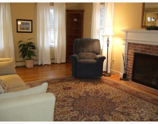 3 Old Chimney Road Barrington, RI 02806 - Photo 2 of 12 Living Room. Front to Back Living Room with Brick Fireplace