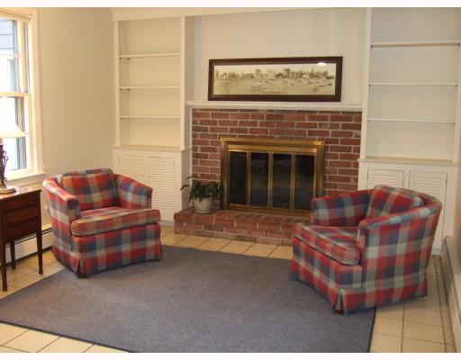 3 Old Chimney Road Barrington, RI 02806 - Photo 4 of 12 Den/Family/Great Room. Family Room with Brick Fireplace and Bookcases
