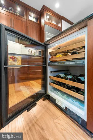 a spacious bathroom with a toilet sink and mirror