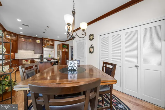a view of a chairs and table in a backyard