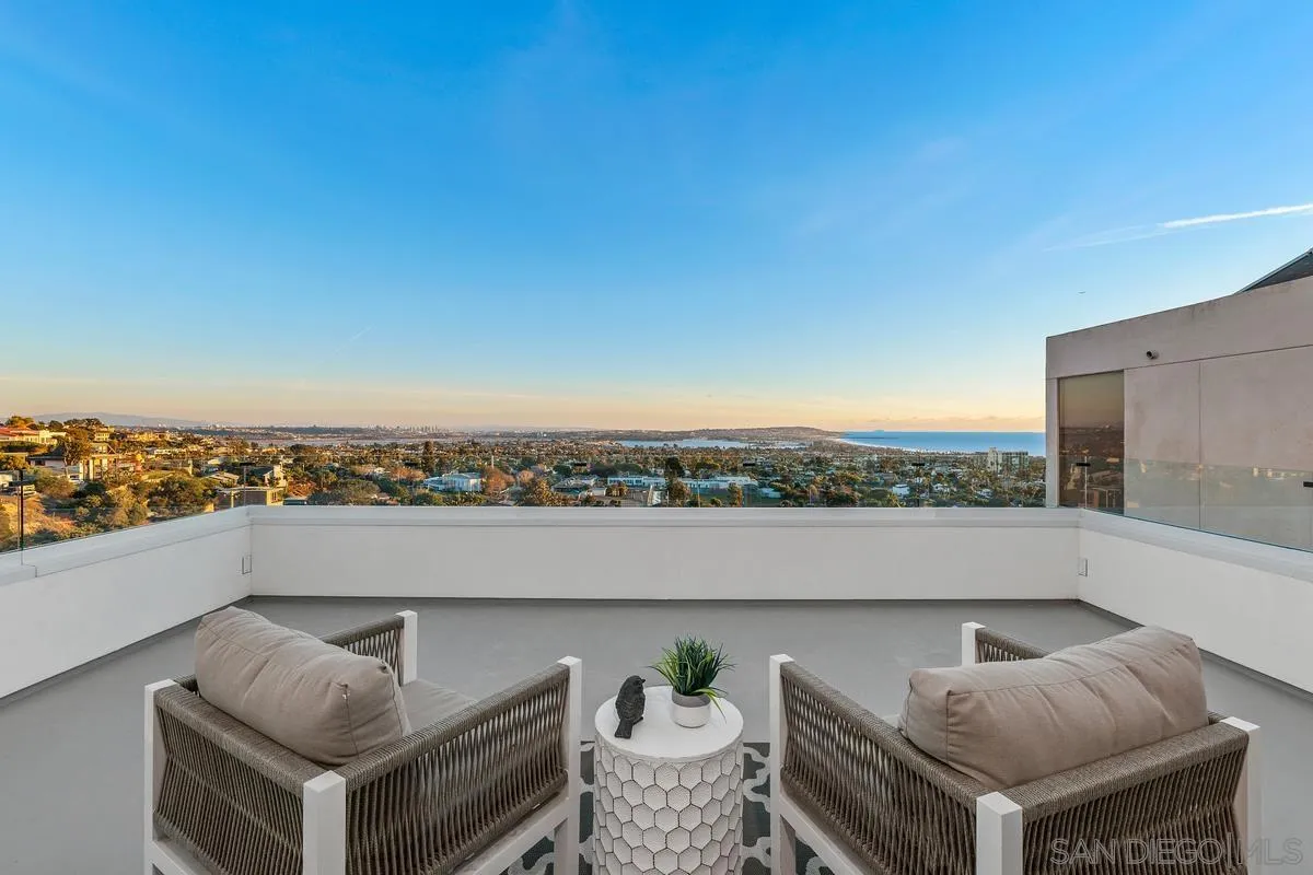 1237 Van Nuys Street San Diego, CA 92109 - Photo 21 of 32 a terrace with outdoor seating and city view