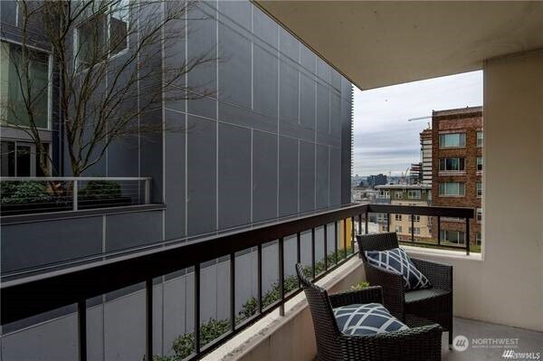2201 3rd Avenue, Unit 804 Seattle, WA 98121 - Photo 14 of 22 a view of a balcony with furniture