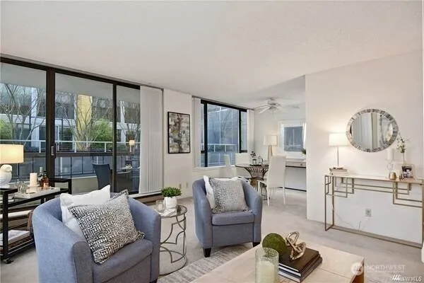 a living room with furniture and a table