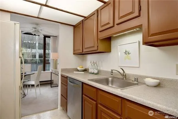 a kitchen with a sink and a cabinets