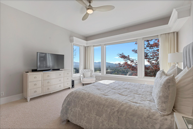 3222 Eagle View Circle Sandy, UT 84092 - Photo 28 of 60 Bedroom featuring ceiling fan and light colored carpet