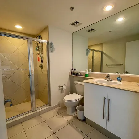 a view of hallway with wooden floor