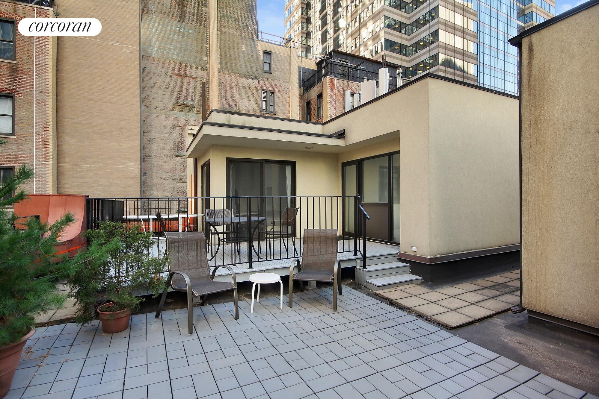 50 Pine Street, Unit PH12N Manhattan, NY 10005 - Photo 8 of 10 a view of an outdoor space with lounge chair
