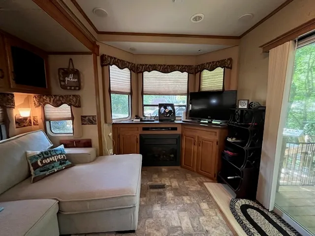 a view of a studio with wooden floor